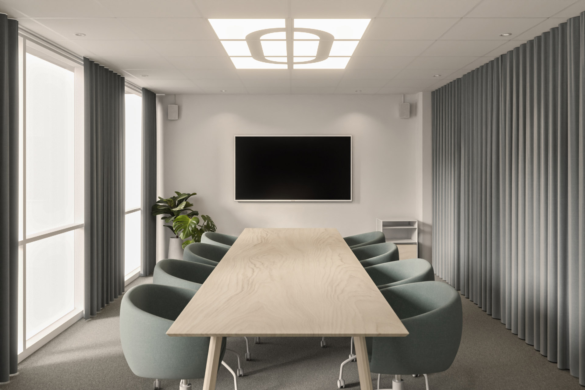 Konferensrum med ett dekorsystem i tak tillsammans med infällda LED-armaturen Bello.