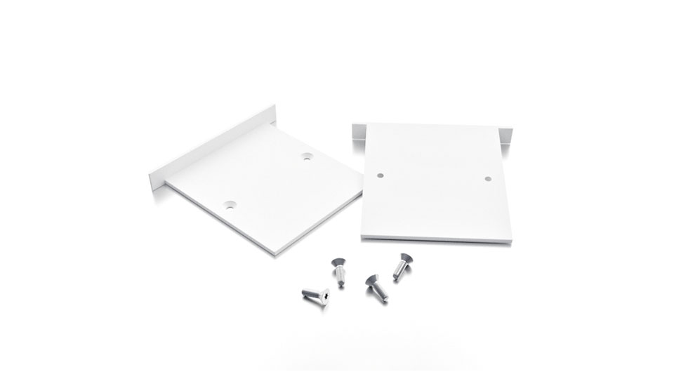 Vit gavelsats för infälld Skyline System – avslut för linjär armatur inom allmänbelysning och korridorbelysning.